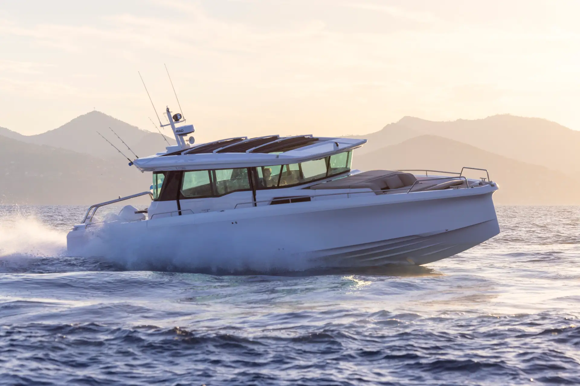 Axopar 45 at speed at sunset